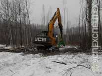 Гусеничный харвестер  · ЛТМ Лесник