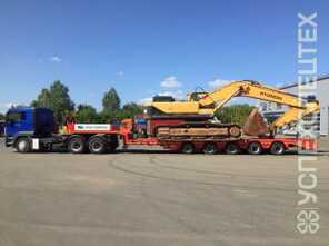 Тягач Man · Грузоподъемность 63 тонны, низкорамный, высота 0.9 м.