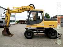 NOBAS · Полноповоротный колесный экскаватор