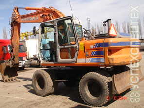 Hitachi · глубина выемки грунта 6 метров