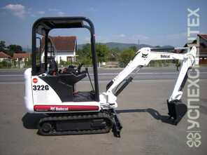 Bobcat 322, Kobelco SK30 · 