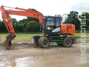 Hitachi  · ZX 170 W